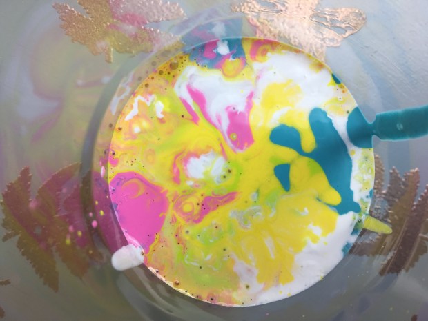 Different paint colours mixed in one cup