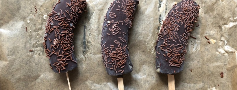 Frozen bananas on greaseproof paper
